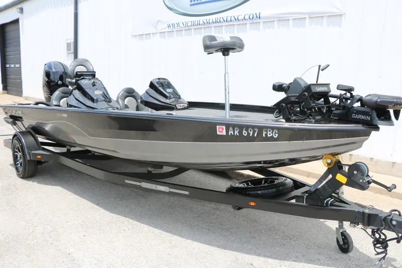 Slide: The Image of 2019 Vexus AVX 1980 fishing boat with Garmin equipment on trailer, parked outdoors. - 3