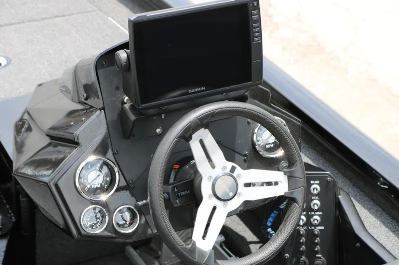 Slide: The Image of 2019 Vexus AVX 1980 boat dashboard with Garmin display and steering wheel. - 30