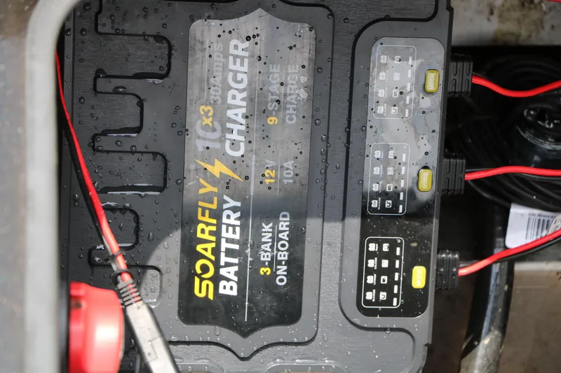 Slide: The Image of On-board battery charger in a 2019 Vexus AVX 1980 boat, featuring SoarFly technology. - 31