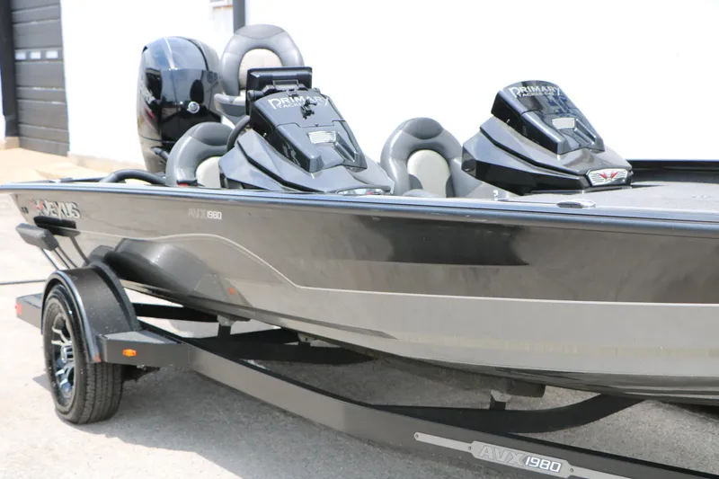 Slide: The Image of 2019 Vexus AVX 1980 boat on trailer, sleek design, dual seats, and powerful engine. - 4
