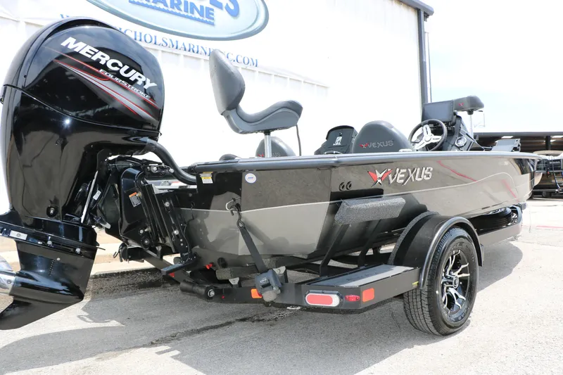 Slide: The Image of 2019 Vexus AVX 1980 boat with Mercury engine, parked on a trailer. - 6