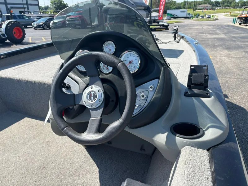 Slide: The Image of Steering wheel and dashboard of a 2012 Tracker Pro Team 190 TX boat. - 10
