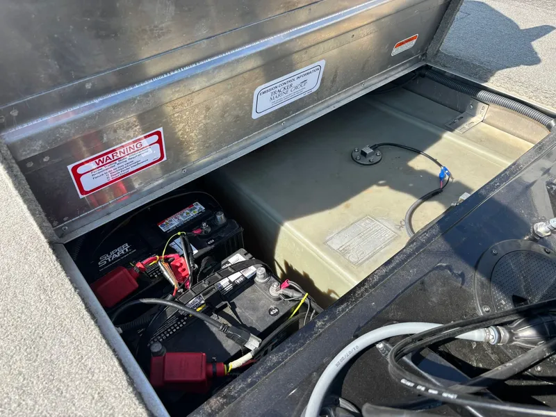 Slide: The Image of Battery compartment of a 2012 Tracker Pro Team 190 TX boat. - 17