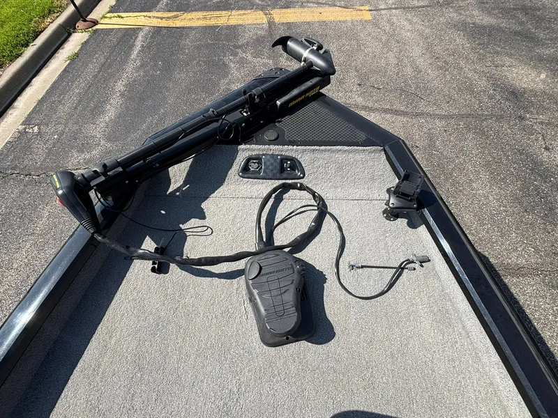Slide: The Image of 2012 Tracker Pro Team 190 TX boat deck with controls. - 23