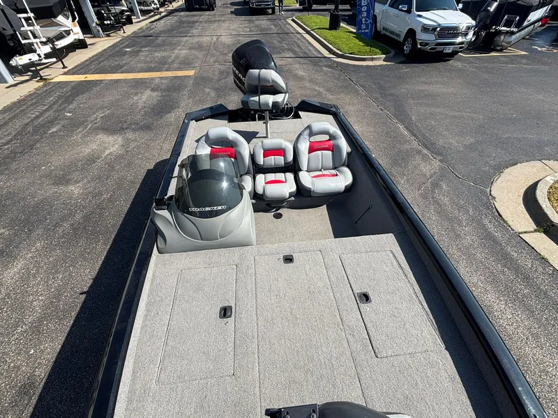 Slide: The Image of 2012 Tracker Pro Team 190 TX boat with gray and red seats. - 24