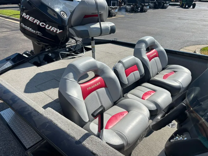 Slide: The Image of 2012 Tracker Pro Team 190 TX boat with Mercury engine. - 8