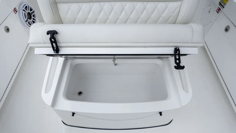Slide: The Image of Everglades 253 Center Console 2026, white storage compartment with padding. - 17