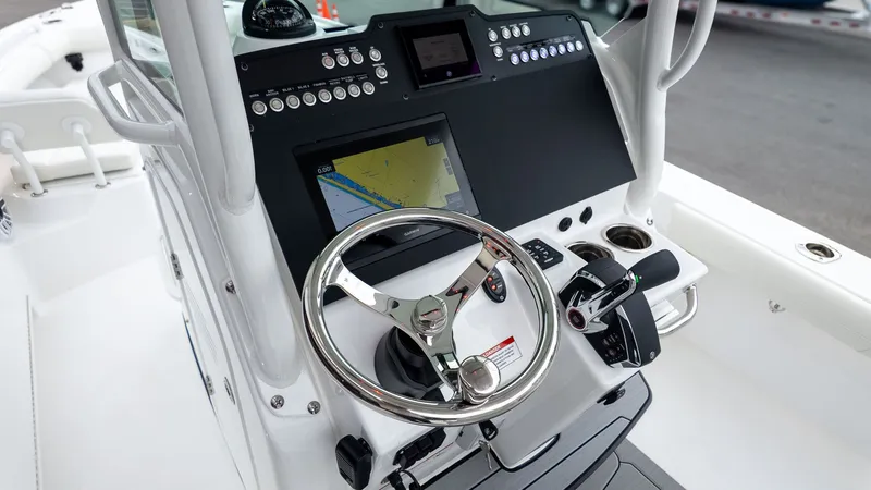 Slide: The Image of Steering console of Everglades 253 Center Console boat, year 2026. - 19
