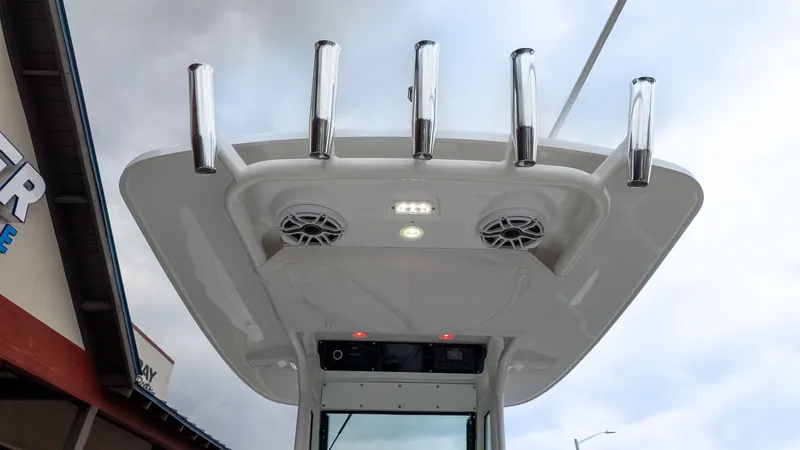 Slide: The Image of Everglades 253 Center Console 2026 with rod holders and speakers. - 22