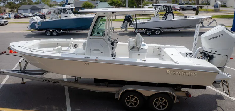 Slide: The Image of 2026 Everglades 253 Center Console boat on trailer, side view. - 4