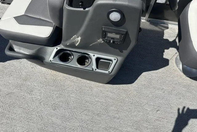 Slide: The Image of Interior of 2026 Sun Tracker Bass Buggy 16 XL Select with cup holders and seating. - 17