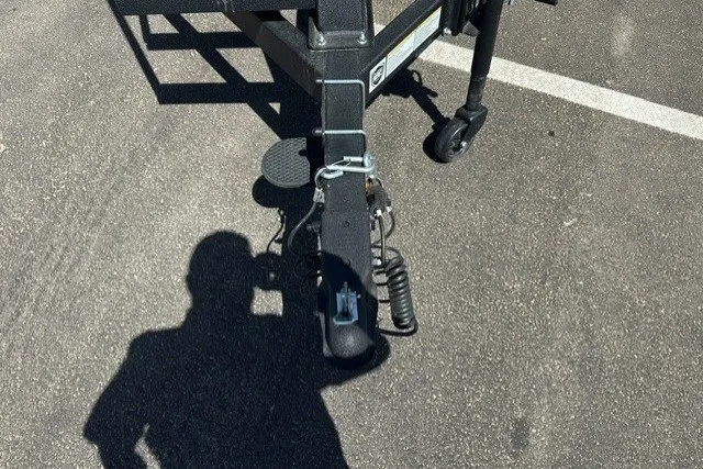 Slide: The Image of Trailer hitch of a 2026 Sun Tracker Bass Buggy 16 XL Select in a parking lot. - 20