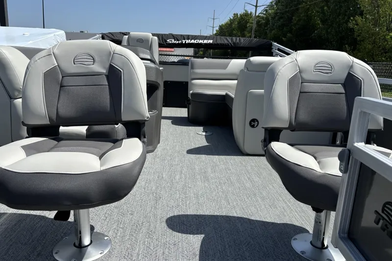 Slide: The Image of 2026 Sun Tracker Fishin' Barge 20 DLX interior with comfortable seating and modern design. - 3