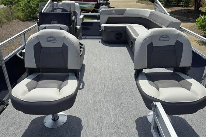 Slide: The Image of 2026 Sun Tracker Bass Buggy 16 XL Select pontoon boat interior with cushioned seating. - 4