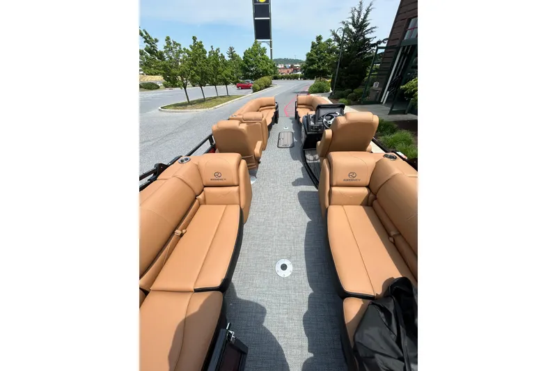 Slide: The Image of Luxurious interior of 2026 Regency 250 DL boat with tan leather seating and modern design. - 5