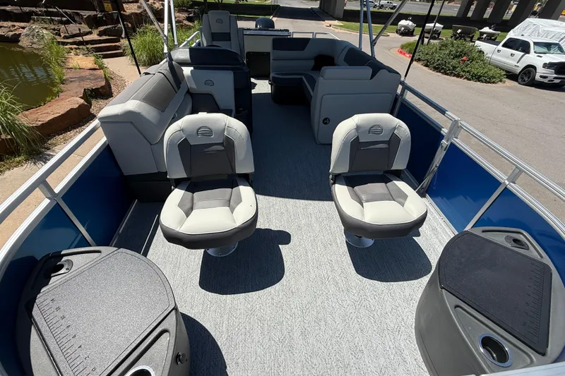 Slide: The Image of 2026 Sun Tracker Fishin' Barge 20 DLX interior with seating and fishing amenities. - 4