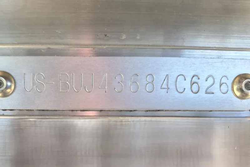 Slide: The Image of Hull identification number on 2026 Sun Tracker Bass Buggy 18 DLX boat. - 11