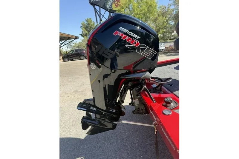 Slide: The Image of Mercury Pro XS engine on 2026 Tracker Pro Team 190 boat, parked outdoors. - 3