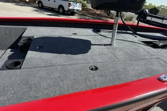 Slide: The Image of 2026 Tracker Pro Team 190 boat deck with red trim and fishing seat. - 5