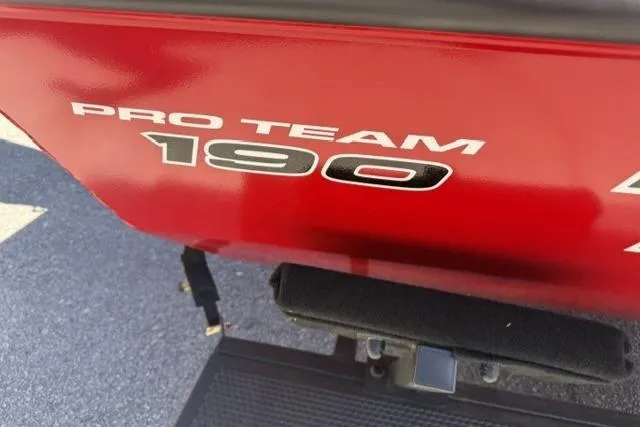 Slide: The Image of 2026 Tracker Pro Team 190 boat, red exterior, close-up view. - 7