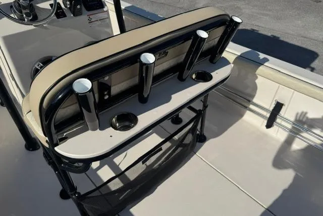 Slide: The Image of 2022 Carolina Skiff 23 LS boat interior with rod holders and seating area. - 11