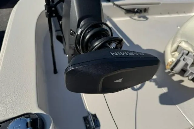 Slide: The Image of 2022 Carolina Skiff 23 LS boat featuring a Garmin trolling motor on deck. - 15