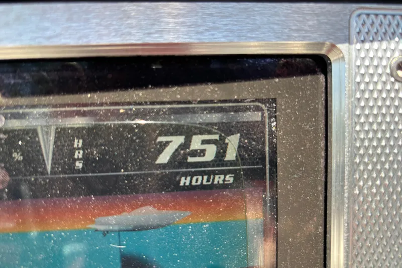 Slide: The Image of Close-up of a 2012 MasterCraft X-15 boat display showing 751 hours. - 11
