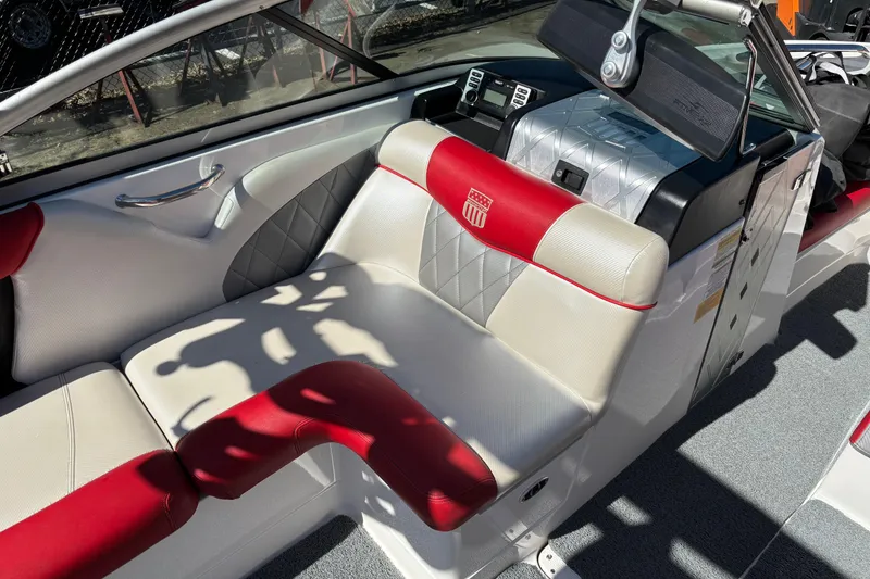 Slide: The Image of Interior of a 2012 MasterCraft X-15 boat with red and white seating. - 7