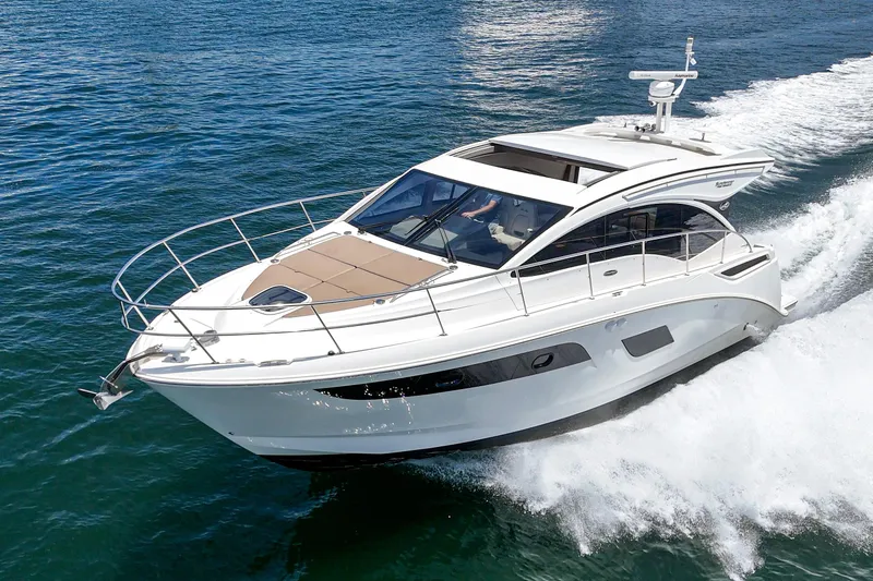 Slide: The Image of 2017 Sea Ray Sundancer 400 cruising on open water, showcasing sleek design and luxury features. - 12
