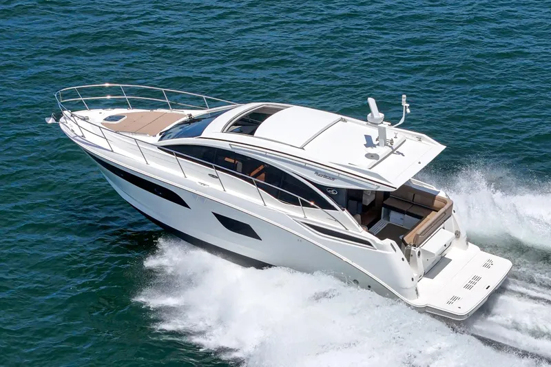 Slide: The Image of 2017 Sea Ray Sundancer 400 yacht cruising on open water. - 19
