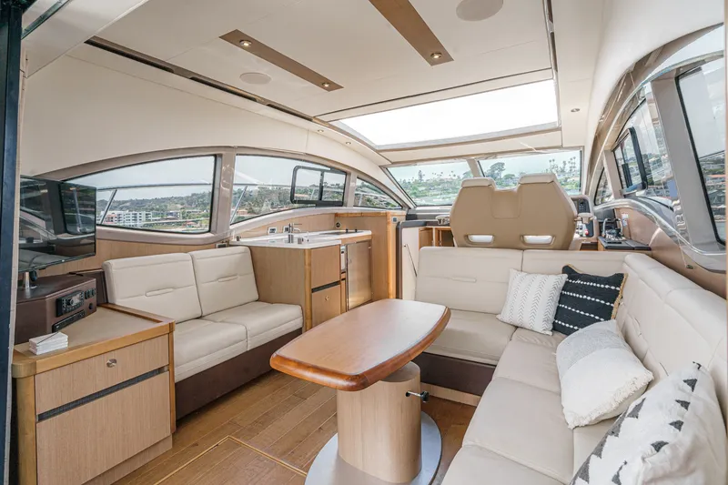 Slide: The Image of Luxurious interior of 2017 Sea Ray Sundancer 400 yacht with elegant seating and panoramic windows. - 14