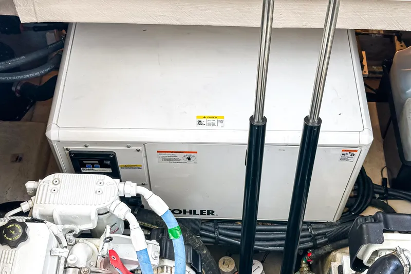Slide: The Image of Engine compartment of a 2017 Sea Ray Sundancer 400 with Kohler generator. - 40