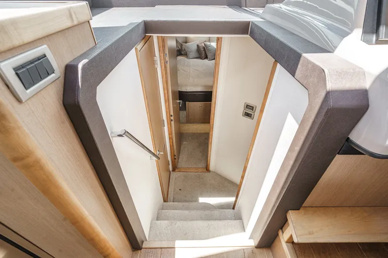 Slide: The Image of Interior view of 2017 Sea Ray Sundancer 400 yacht, showing stairs leading to cabin. - 30