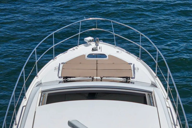 Slide: The Image of 2017 Sea Ray Sundancer 400 yacht bow view on open water. - 68