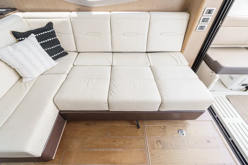 Slide: The Image of Luxurious interior seating of 2017 Sea Ray Sundancer 400 yacht with plush cushions. - 13