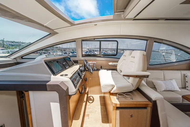 Slide: The Image of Luxurious interior of 2017 Sea Ray Sundancer 400 yacht with modern helm and seating. - 23