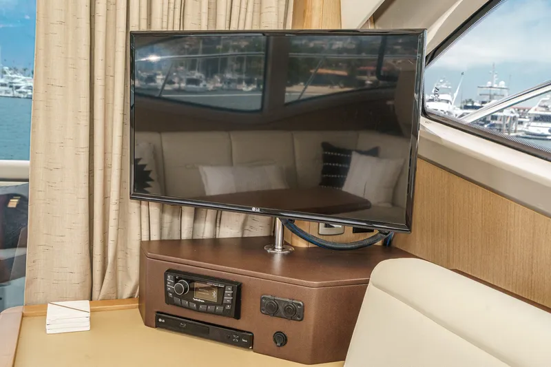 Slide: The Image of Interior of 2017 Sea Ray Sundancer 400 yacht with TV and audio system. - 16