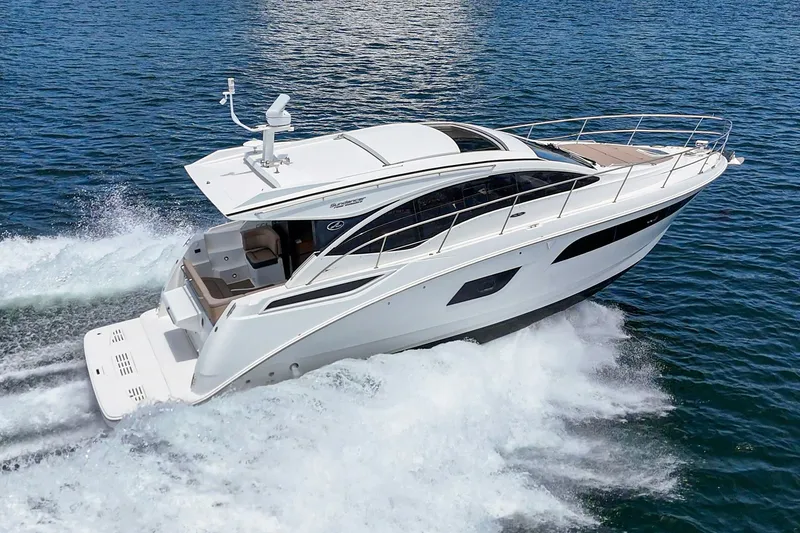 Slide: The Image of 2017 Sea Ray Sundancer 400 cruising on open water, showcasing sleek design and performance. - 49