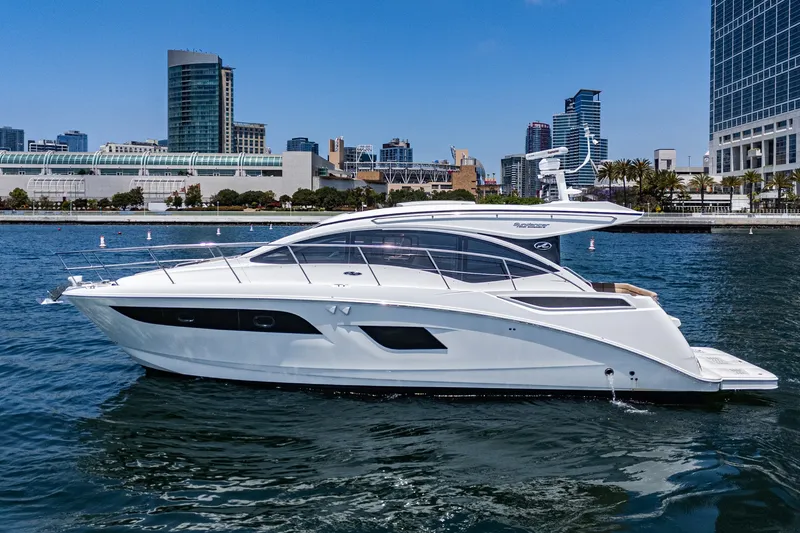 Slide: The Image of 2017 Sea Ray Sundancer 400 yacht cruising in urban waterfront setting. - 70