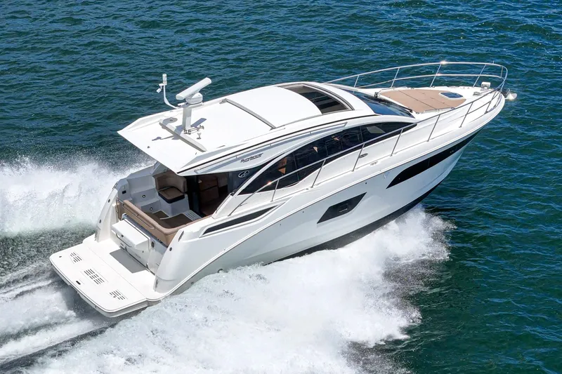 Slide: The Image of 2017 Sea Ray Sundancer 400 cruising on open water, showcasing sleek design and performance. - 61