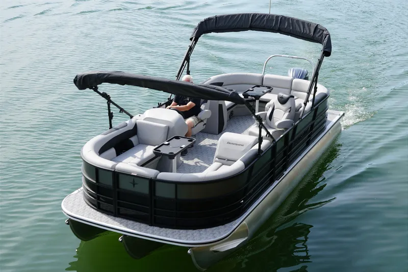 Slide: The Image of Berkshire 24 RFX LE 2026 pontoon boat on calm water. - 1