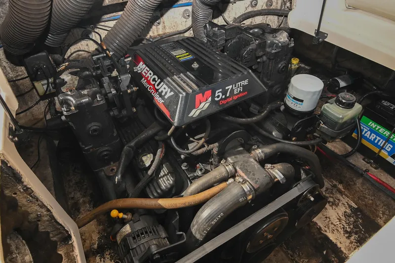 Slide: The Image of Engine compartment of a 2002 Sea Ray 240 Sundeck with Mercury MerCruiser 5.7L EFI engine. - 36