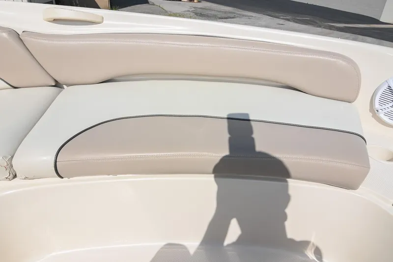 Slide: The Image of Cream and beige seating on a 2002 Sea Ray 240 Sundeck boat. - 37