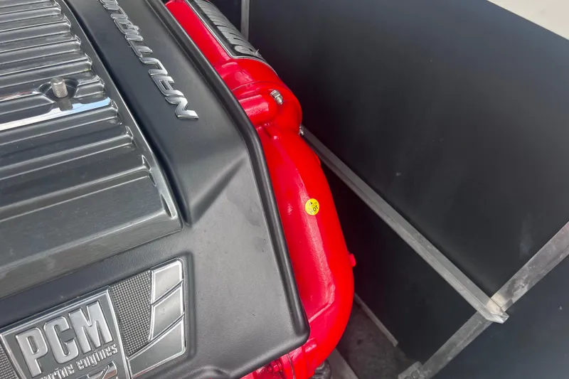 Slide: The Image of Engine compartment of 2016 Nautique Super Air Nautique 210 with PCM marine engine. - 34
