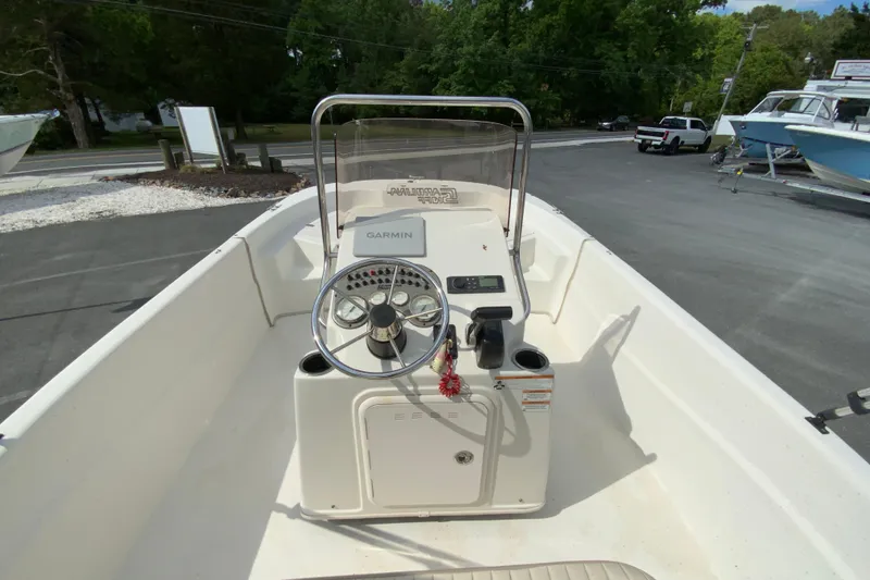 Slide: The Image of 2016 Carolina Skiff 198 DLV boat console with Garmin navigation system. - 16
