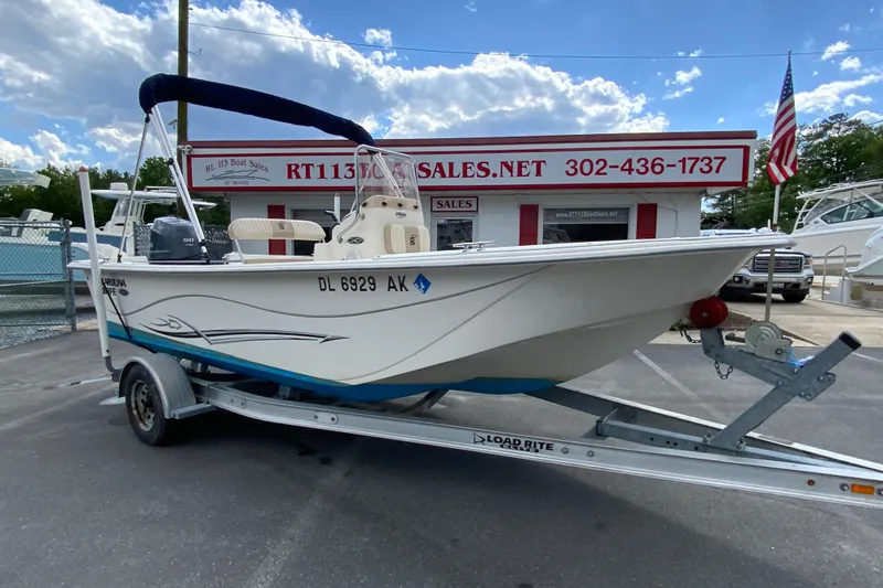 Slide: The Image of 2016 Carolina Skiff 198 DLV boat on trailer at RT113 Boat Sales dealership. - 7