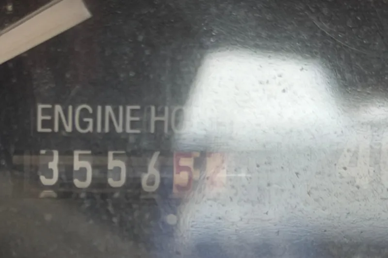 Slide: The Image of Engine hour meter showing 3556.5 hours on 1998 Mainship 47 Motor Yacht. - 39