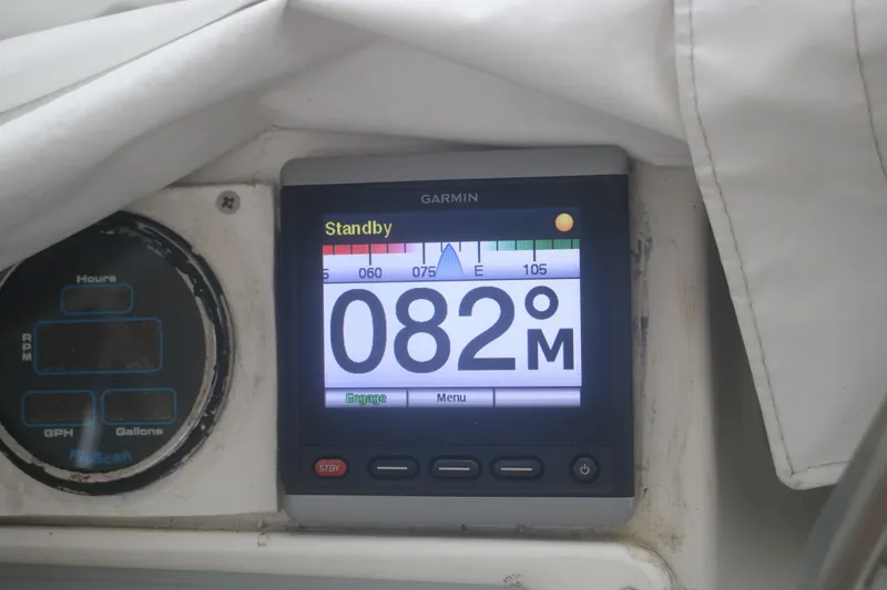 Slide: The Image of Garmin navigation display on 1998 Mainship 47 Motor Yacht showing 082 degrees. - 56