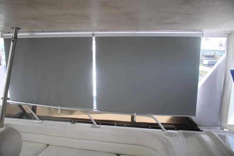 Slide: The Image of Interior of 1998 Mainship 47 Motor Yacht with closed window blinds. - 57