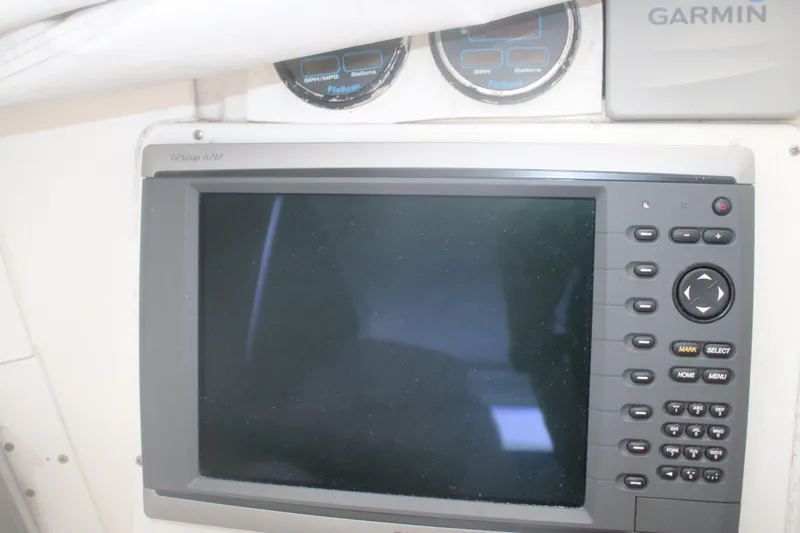 Slide: The Image of Garmin GPS display on 1998 Mainship 47 Motor Yacht dashboard. - 63
